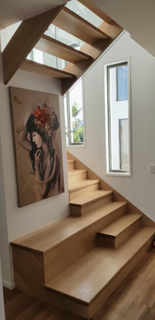 Stadium stair with painting in the foreground and windows in the background