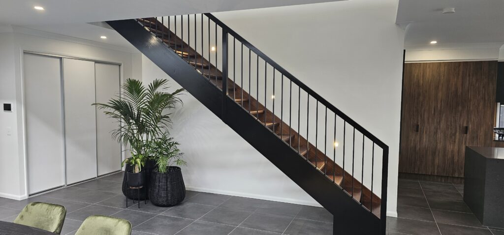 Open stair with powdercoated balustrade
