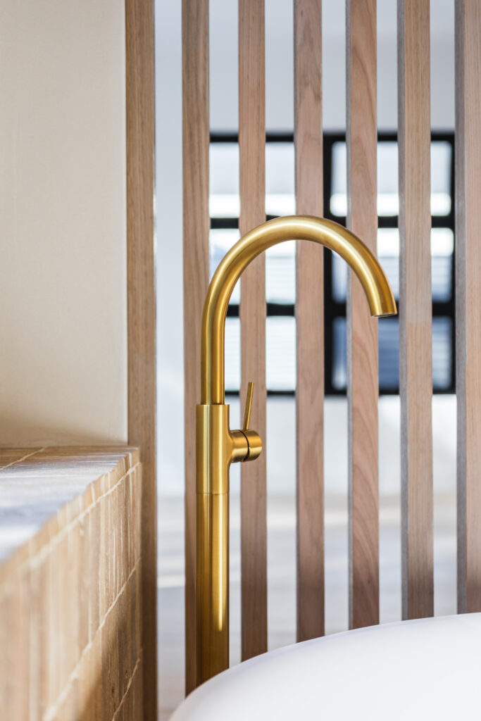 Tap over bath with Timber Screen in background
