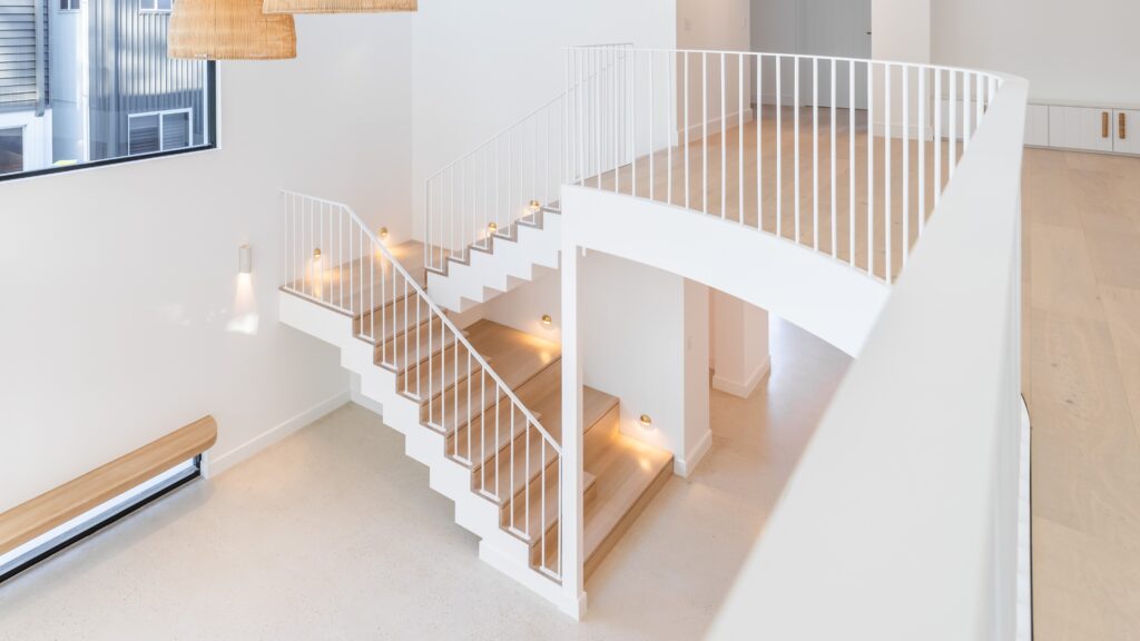 View of stair and balustrade looking down from void
