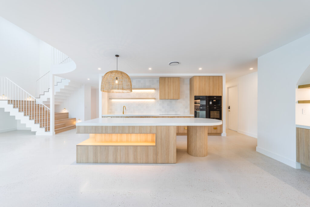 View of kitchen with stair and balustrade in the background