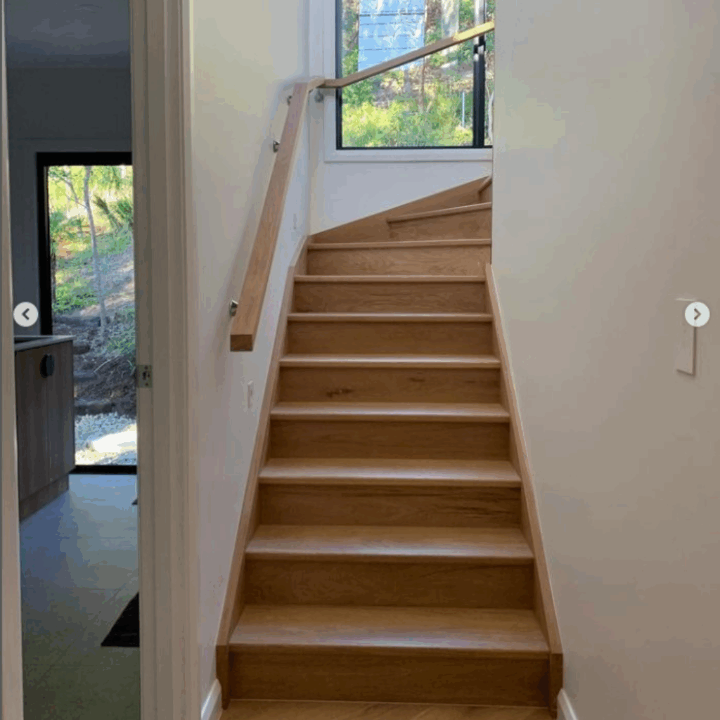 stair in foreground with windows in background