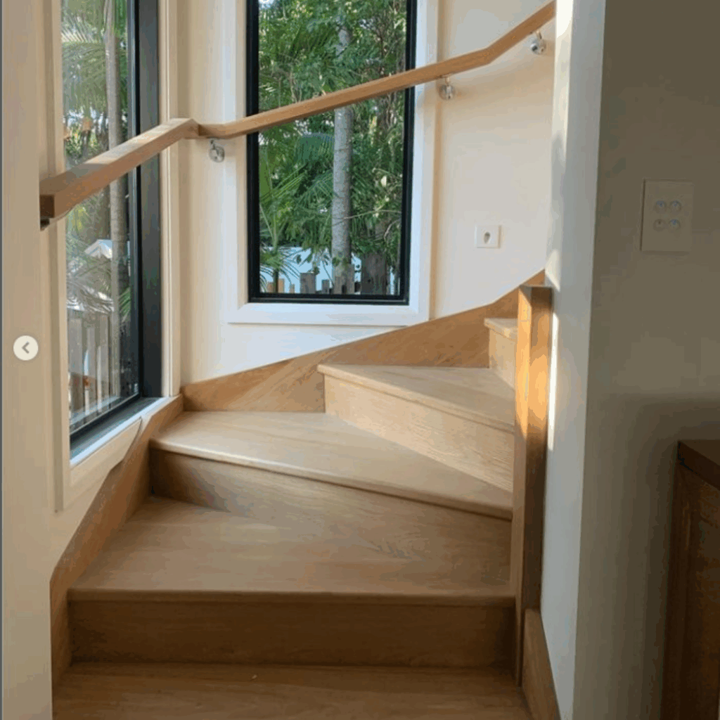 stair in foreground with windows in background