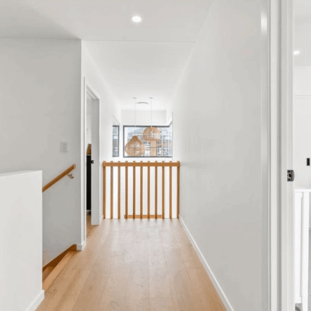 Timber balustrade at the end of a hallway
