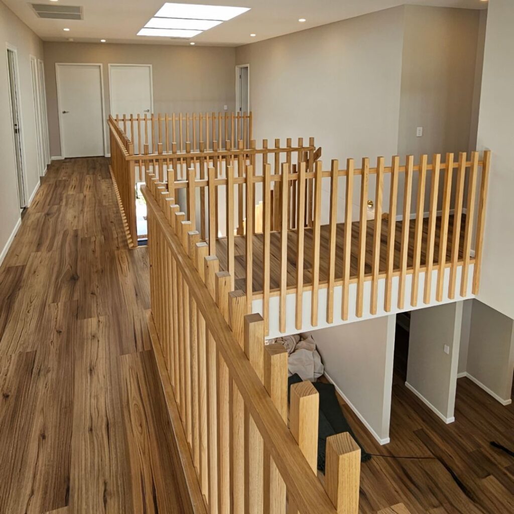 Corridor with timber balustrade along void area